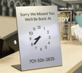 Sorry We Missed You signs with Clock