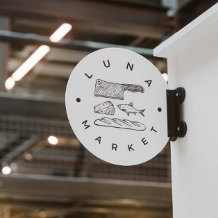 Luna Market Projecting Sign