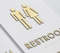 Restroom Signs, Gold Text on White substrate for hotels and high end establishments, demanding professionals.